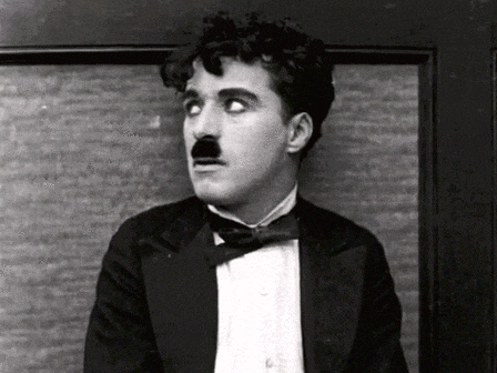 Charlie Chaplin Wink GIF