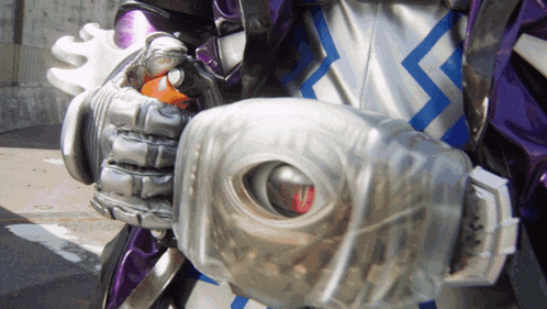 a close up of a person 's hand with a glove on