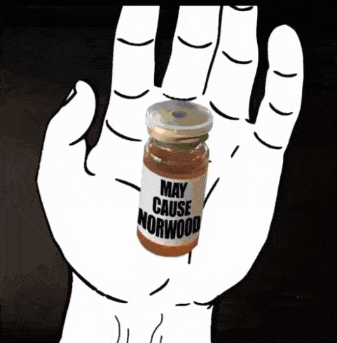 a hand is holding a bottle of may cause norwood