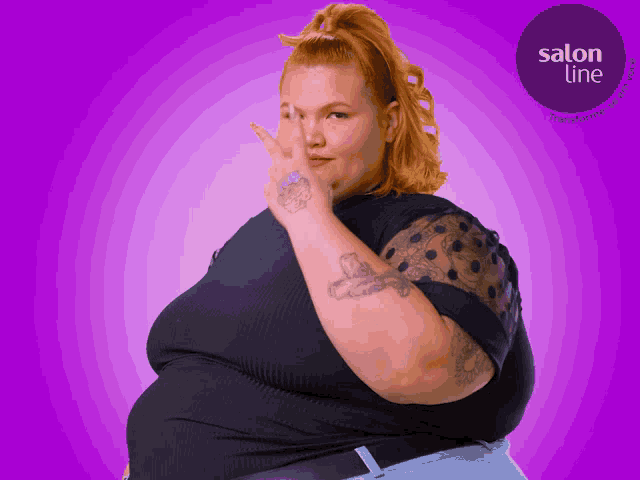 a woman with red hair stands in front of a purple background that says salon line
