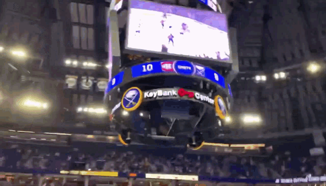 a keybank center sign is hanging from the ceiling