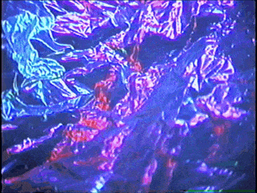 a purple and blue background with a swirl of light