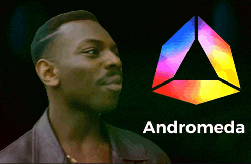 a man is standing in front of a colorful logo for andromeda