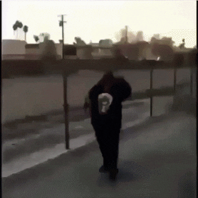 a person wearing a black hoodie with the number 9 on it