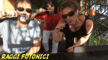 a man and two women brushing their teeth with the words " raggi fotonici " on the bottom