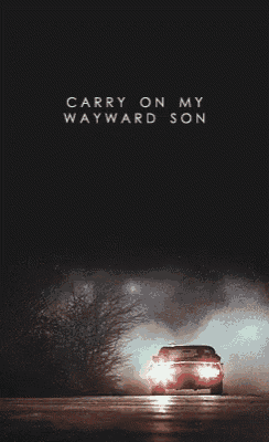 a car is driving down a road at night with the words " carry on my wayward son " on the bottom