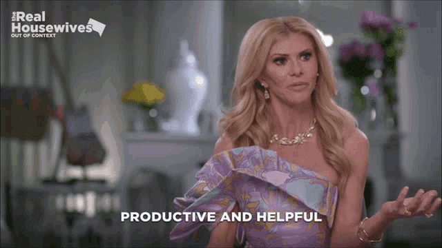 a woman in a purple dress says " productive and helpful " on the screen