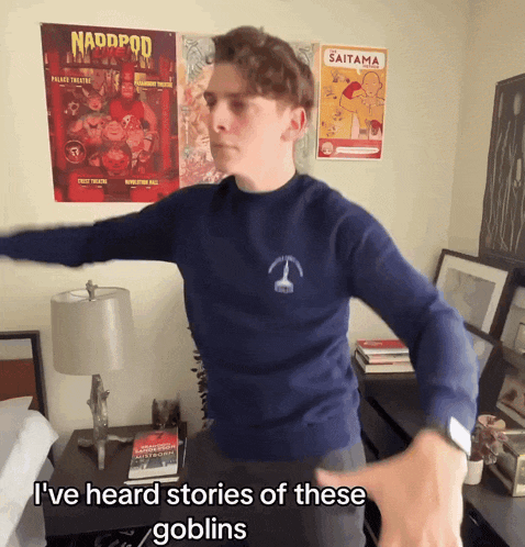 a man in a blue sweater says i 've heard stories of these goblins in a bedroom