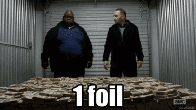 two men standing next to a pile of money with the words 1 foil written on it