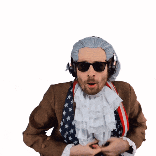 a man wearing a wig and sunglasses is wearing an american flag scarf