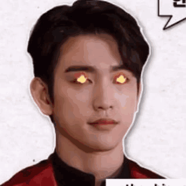 a close up of a man with red eyes and a speech bubble .