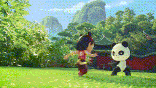 a girl and a panda are playing in a park
