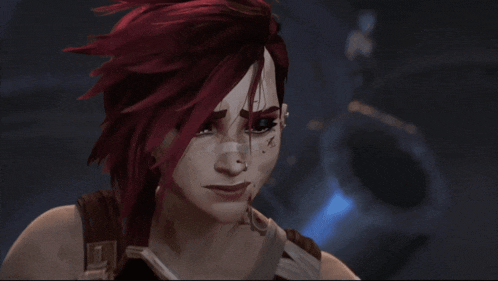 a woman with red hair and a piercing in her nose