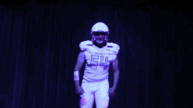 a football player wearing a white jersey that says prospect