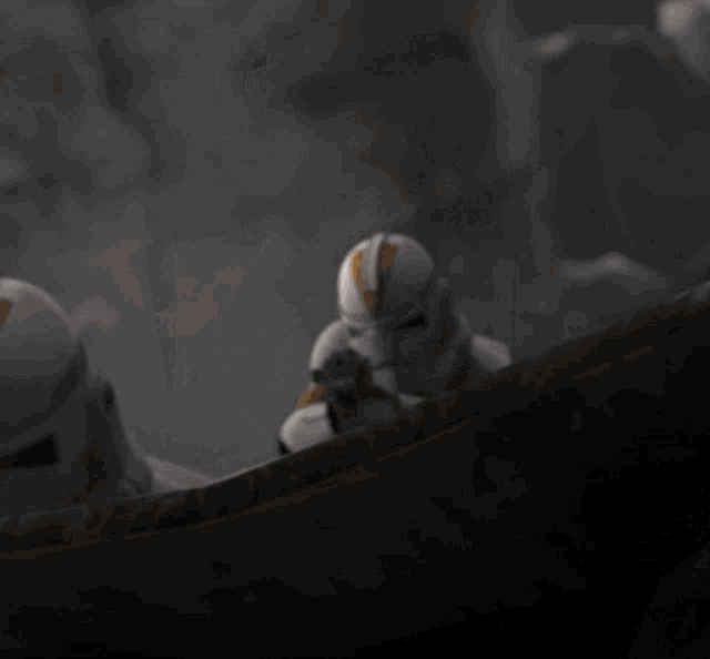 a close up of a clone trooper helmet with the letters jjc on it