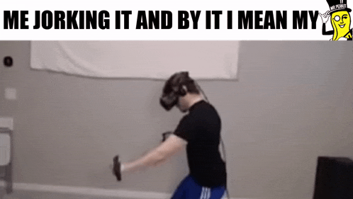 a man wearing a virtual reality headset is holding a dumbbell in his hand .