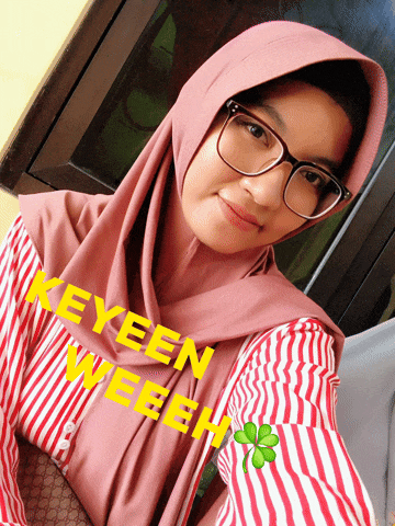 a woman wearing glasses and a hijab with the name keyeen weeeh written on it