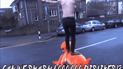 a man standing on top of a stuffed animal with the words can we smash 1,000,000 dishes written below him