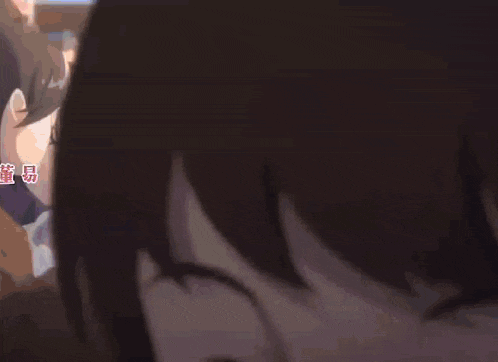 a girl with long black hair and blue eyes is in a crowd of people