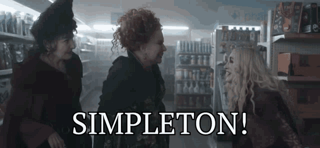 three women standing in a store with the words simpleton written on the bottom