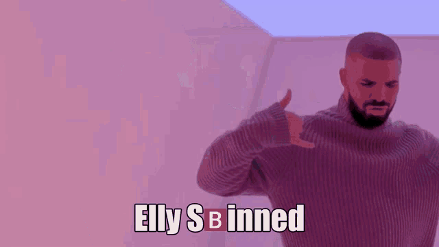 a man in a turtleneck sweater says elly s b inned