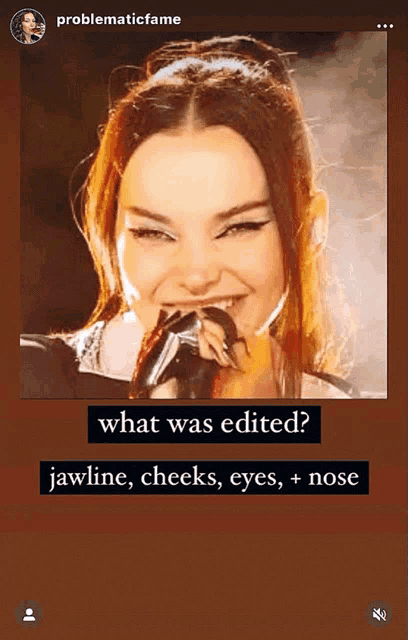 a picture of a woman holding a microphone with the caption " what was edited "