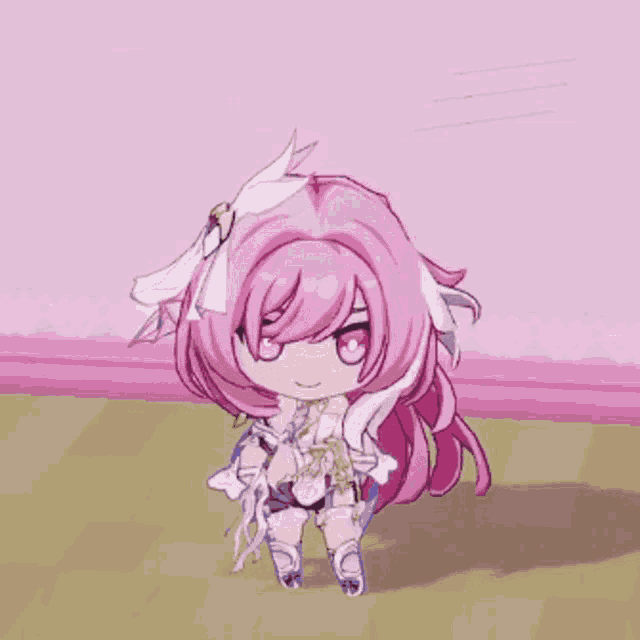 a girl with pink hair and white feathers is sitting on the floor