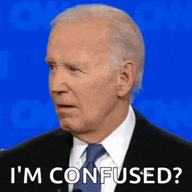 a man in a suit and tie says i 'm confused on a blue background .