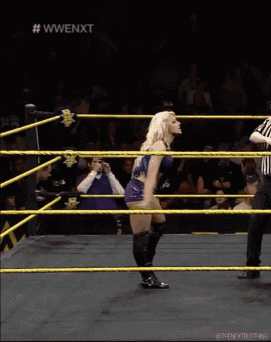 a woman in a wrestling ring with the hashtag wwenxt on the top