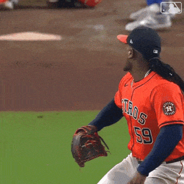 a baseball player with the number 24 on his jersey is swinging at a pitch