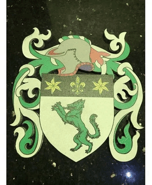 a coat of arms with a wolf and a helmet on it is on a table .
