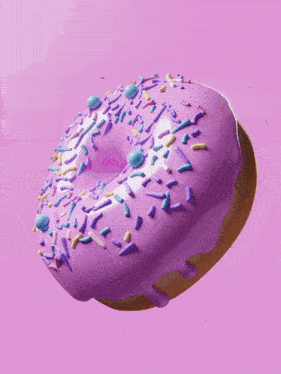 a donut with purple frosting and sprinkles on it