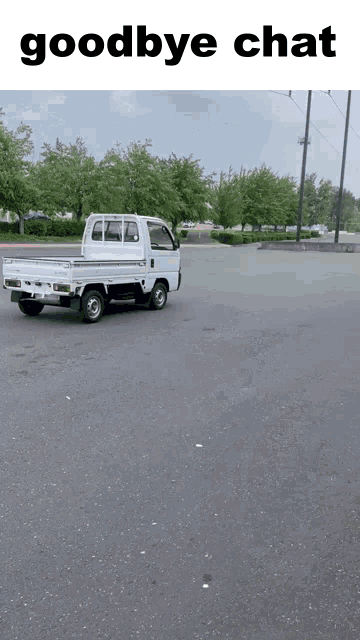 a white truck is driving down a road with the words goodbye chat written above it