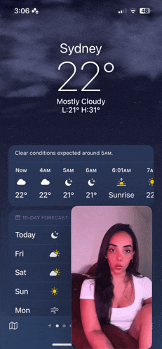 a phone screen shows the temperature in sydney at 22 degrees celsius