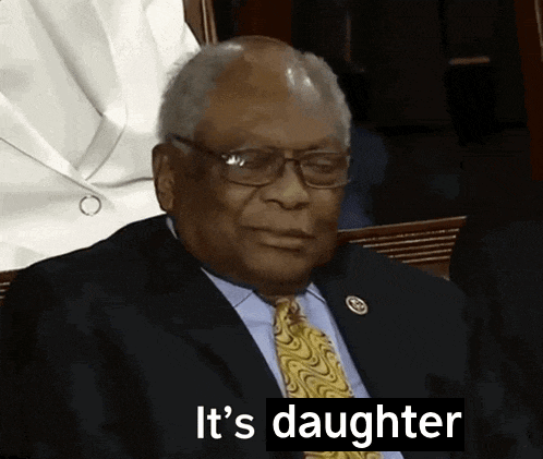 a man in a suit and tie says it 's daughter in a speech