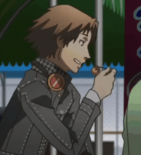 a man wearing headphones has a circle around his neck that says ' n ' on it