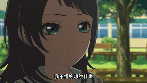 a girl with chinese writing on her face looks at the camera