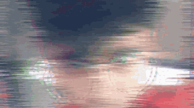 a blurry image of a person 's face with a blurred background .