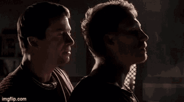 two men are standing next to each other with the words " i am your master " written above them