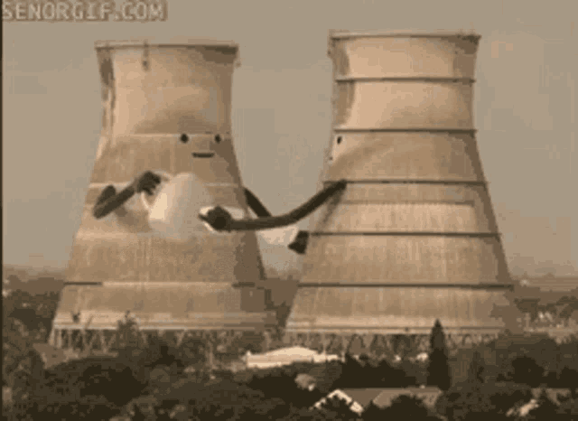 a picture of a building being demolished with the website senogif.com at the bottom