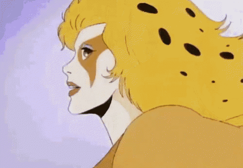 a close up of a cartoon character 's face with blue eyes and yellow hair