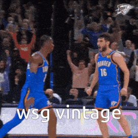 two basketball players in blue uniforms with the number 16 on them