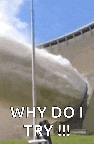 a man is standing in front of a waterfall with the words " why do i try !!! "