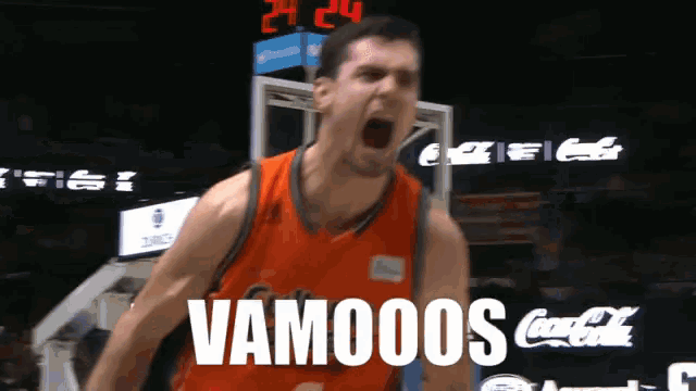 a basketball player with the word vamos on the front of his jersey