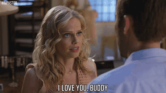 a woman says " i love you buddy " while looking at a man