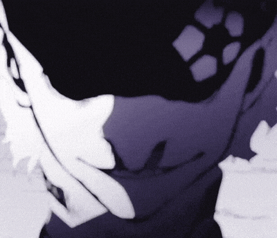a close up of a person 's face with a shadow on it
