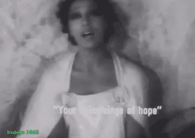 a black and white photo of a woman singing a song with the words " your voice sings of hope "