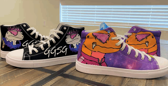 a pair of ggsg shoes are on a table
