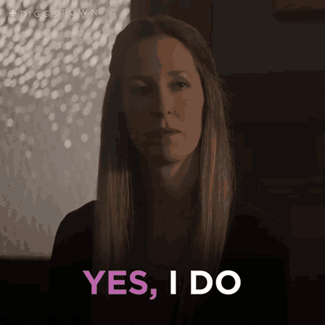 a woman says yes i do in purple