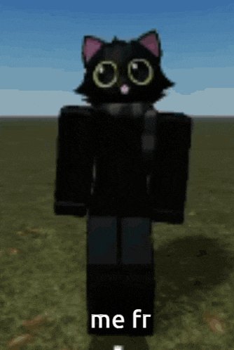 a black cat with a pink ear is standing in a field and says me fr .